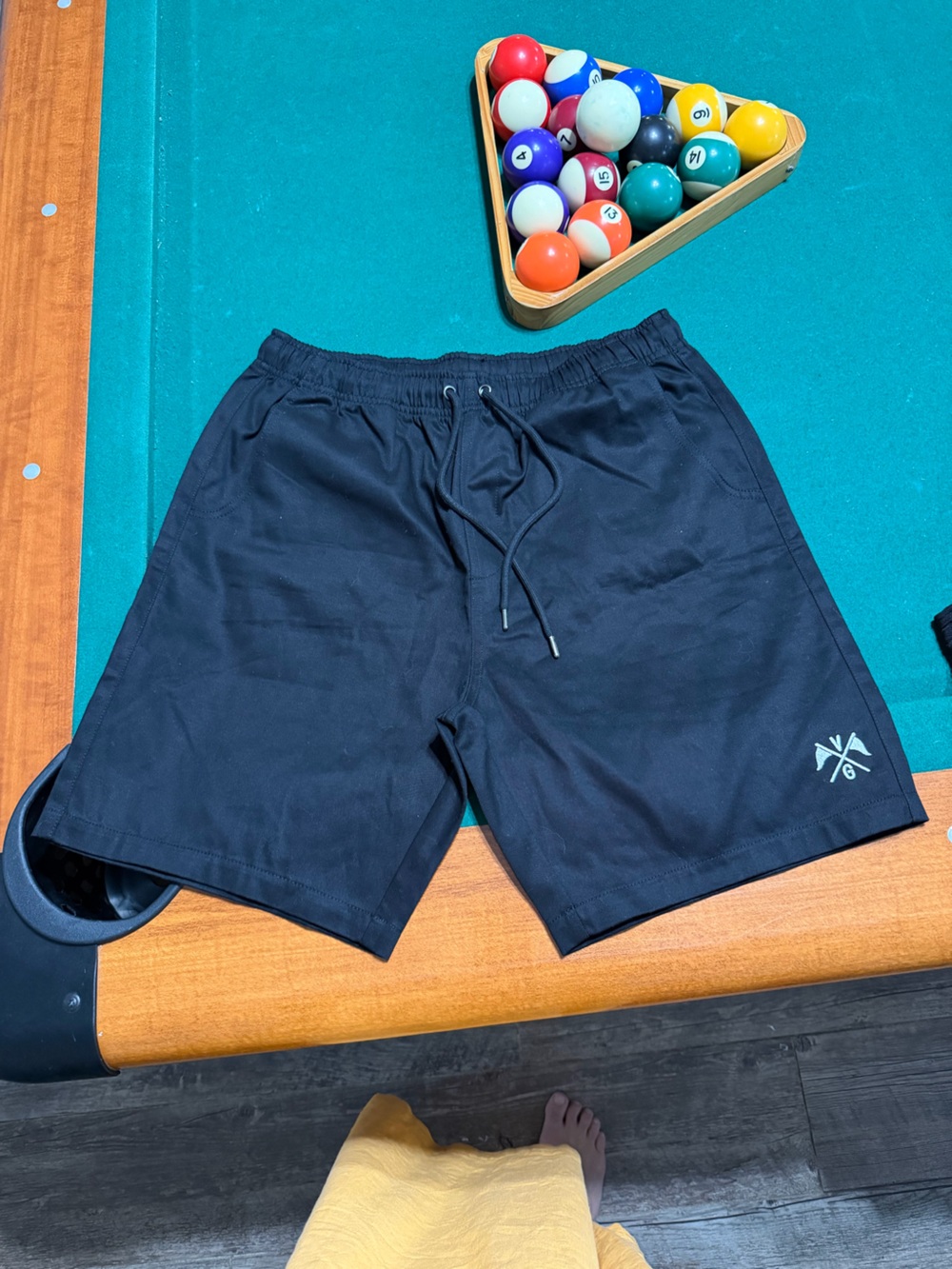 Classic Black Men's Board Shorts with Subtle Logo